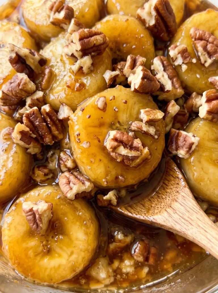golden caramelized banana rounds with crushed pecans and amber maple syrup — topping for banana bread overnight oats